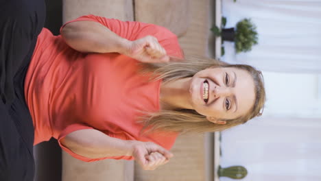 Vertical-video-of-Woman-clapping-excitedly-to-camera.